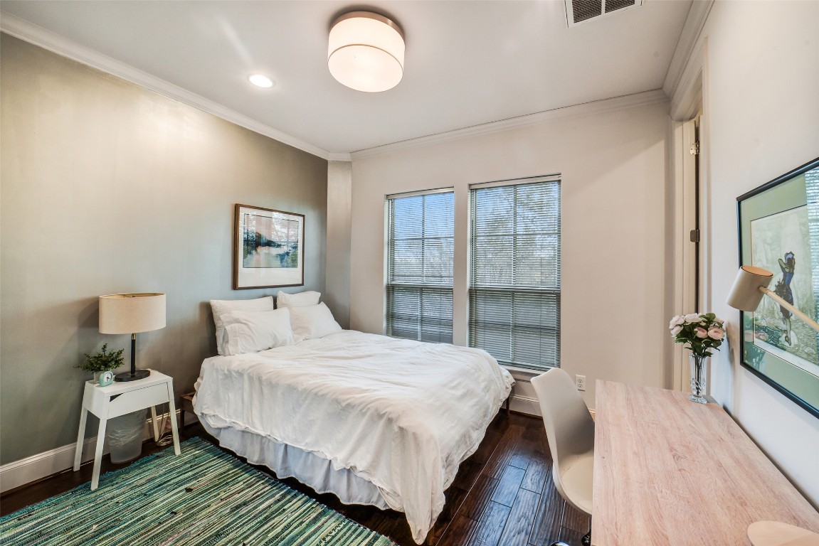 15943 Morgan Street Sugar Land, TX 77478 - Photo 26 of 41 a bedroom with a large bed and a large window