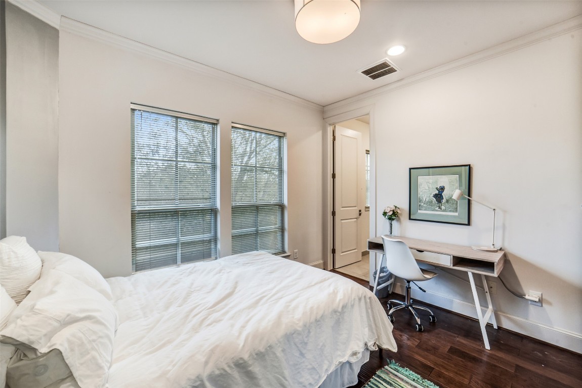 15943 Morgan Street Sugar Land, TX 77478 - Photo 27 of 41 a bedroom with a bed and a desk