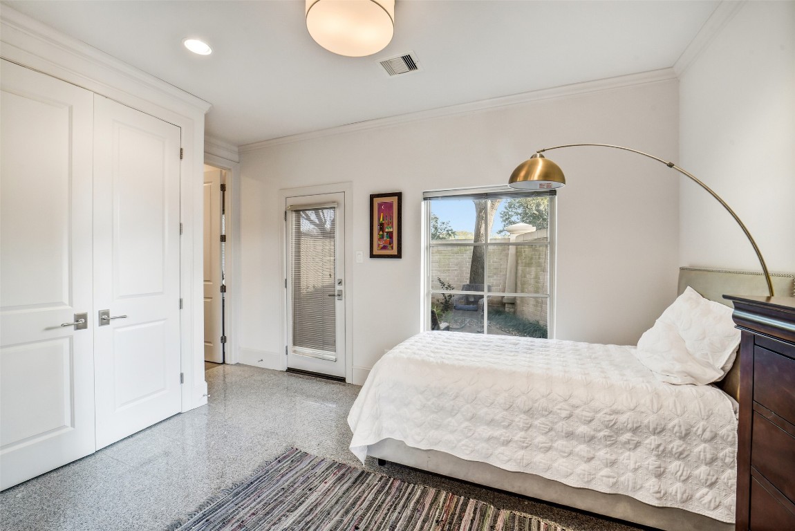 15943 Morgan Street Sugar Land, TX 77478 - Photo 29 of 41 a bedroom with a bed and a window