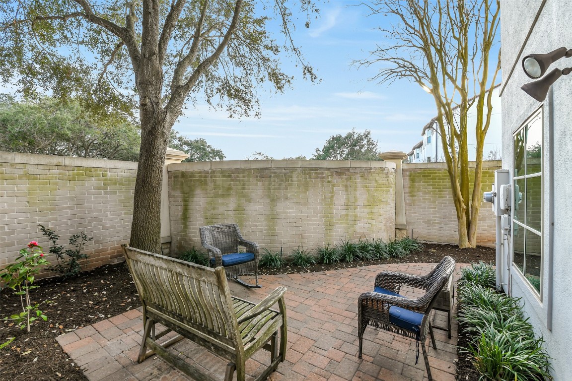 15943 Morgan Street Sugar Land, TX 77478 - Photo 31 of 41 a view of a lake with couches and wooden floor