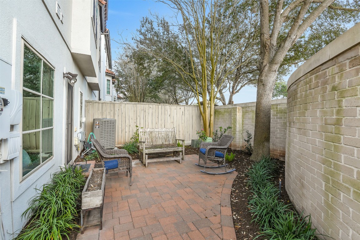 15943 Morgan Street Sugar Land, TX 77478 - Photo 34 of 41 a backyard of a house with outdoor seating