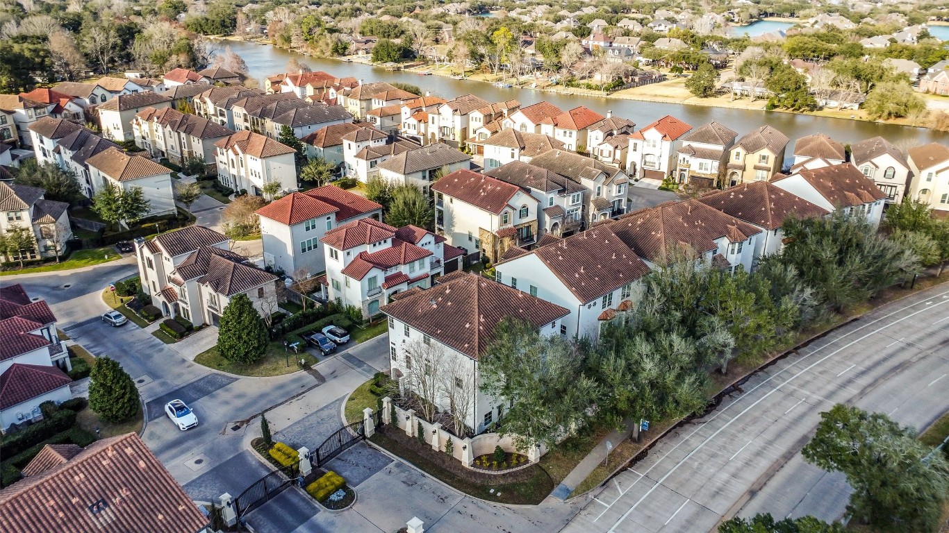 15943 Morgan Street Sugar Land, TX 77478 - Photo 40 of 41 an aerial view of residential houses with outdoor space and parking