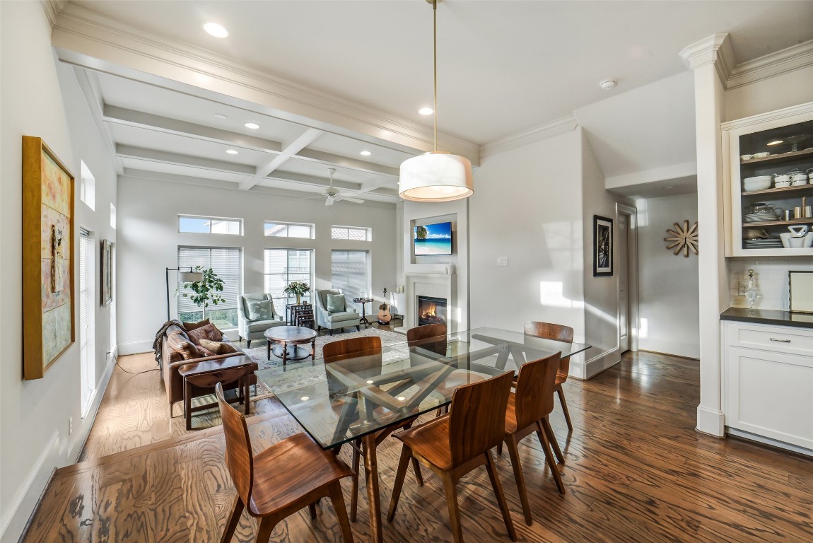 15943 Morgan Street Sugar Land, TX 77478 - Photo 9 of 41 a view of a dining room with furniture and wooden floor