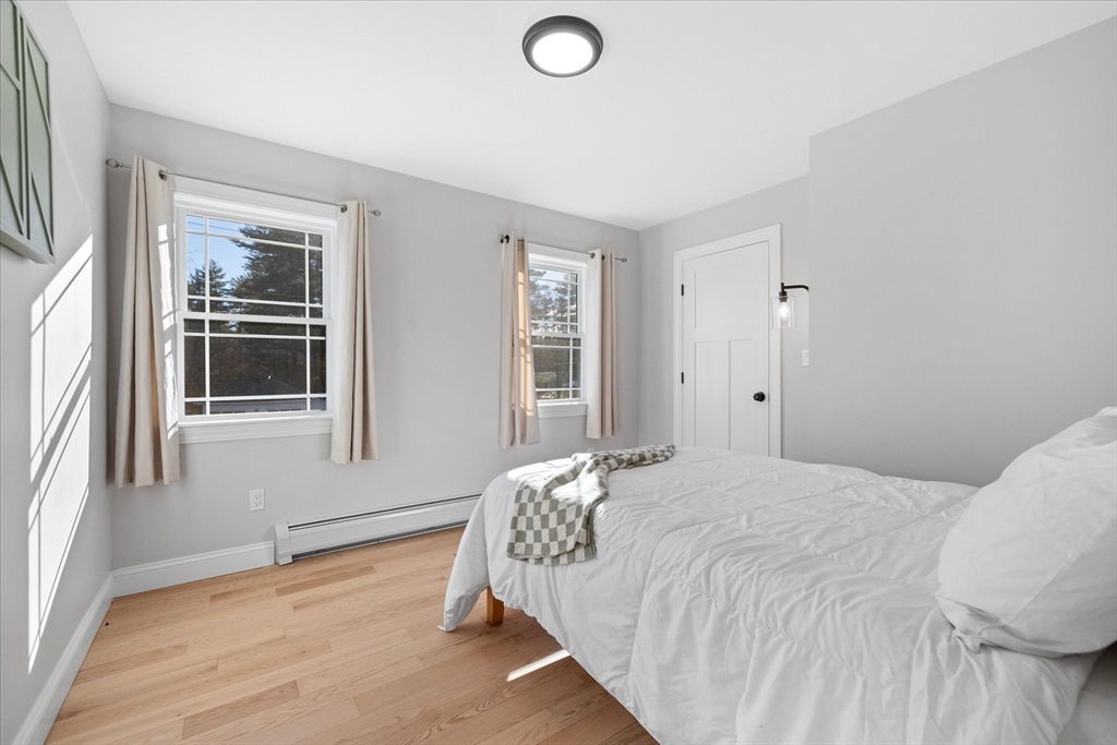245 Brookside Road Athol, MA 01331 - Photo 18 of 27 a bedroom with a bed and a window