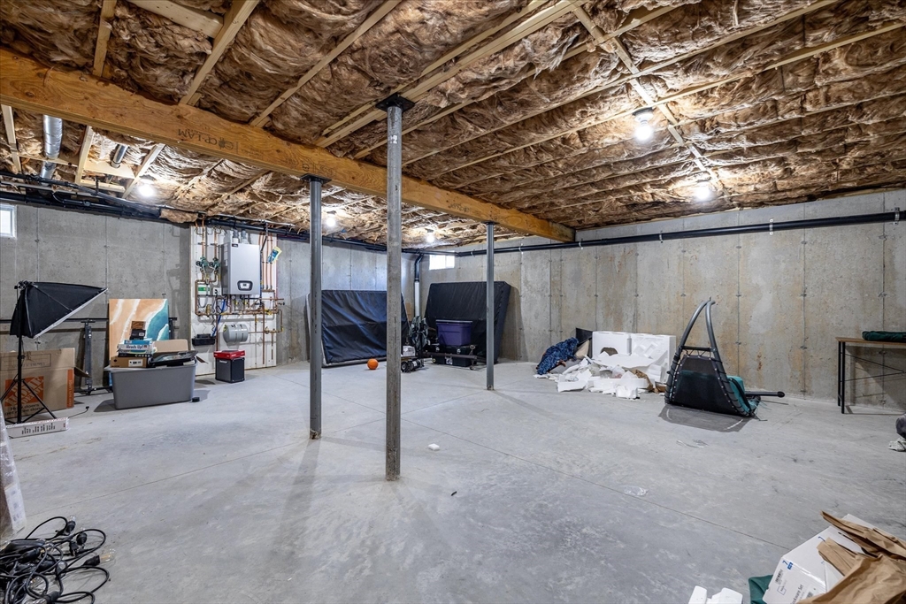245 Brookside Road Athol, MA 01331 - Photo 20 of 27 a view of a big room with air conditioner duct and materials on floor
