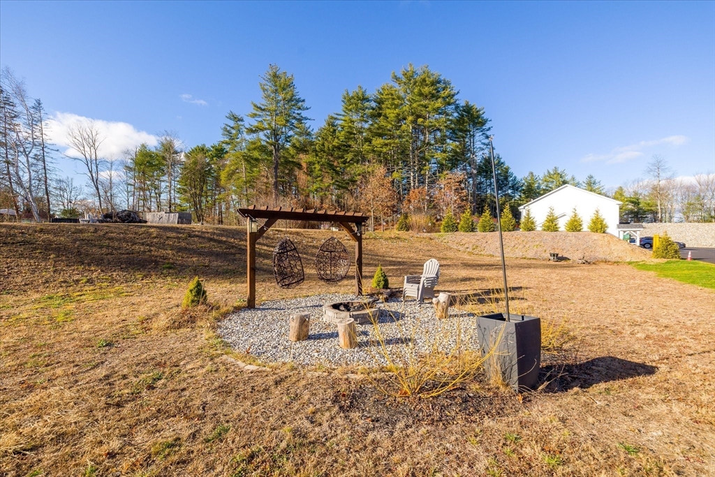 245 Brookside Road Athol, MA 01331 - Photo 23 of 27 a swimming pool with some trees in the background