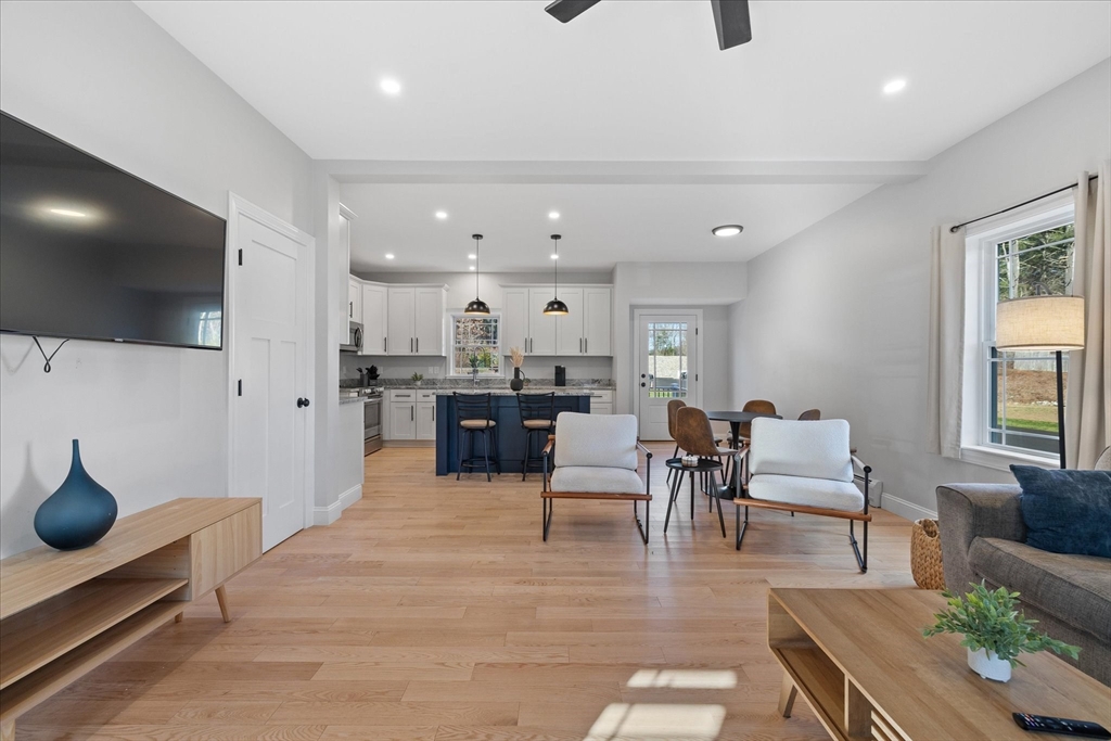 245 Brookside Road Athol, MA 01331 - Photo 7 of 27 a living room with furniture and a flat screen tv