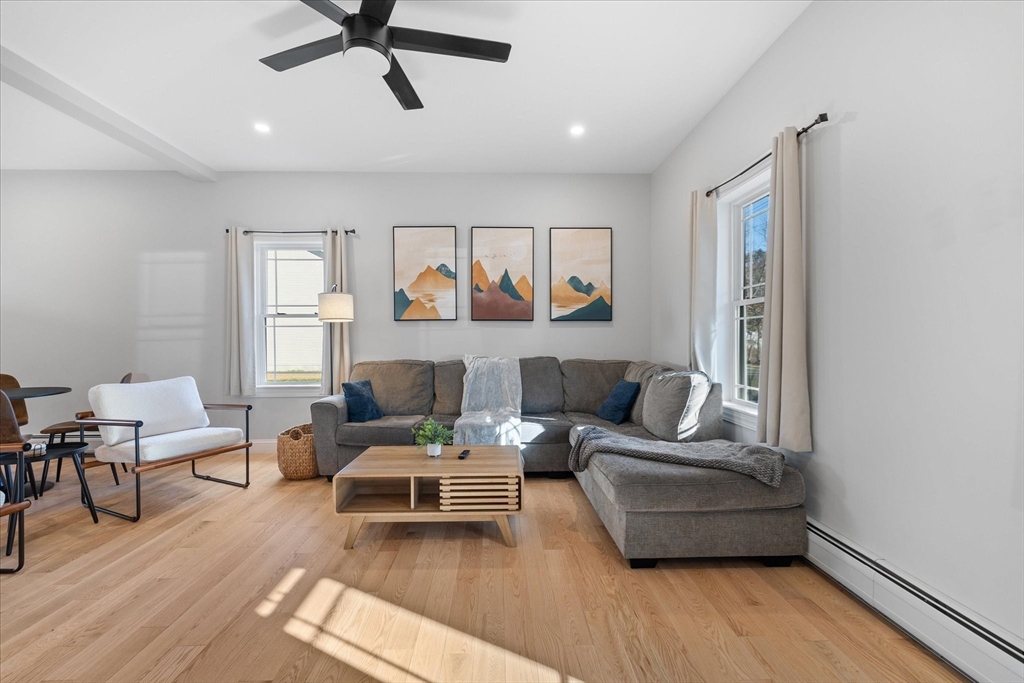 245 Brookside Road Athol, MA 01331 - Photo 9 of 27 a living room with furniture and a wooden floor