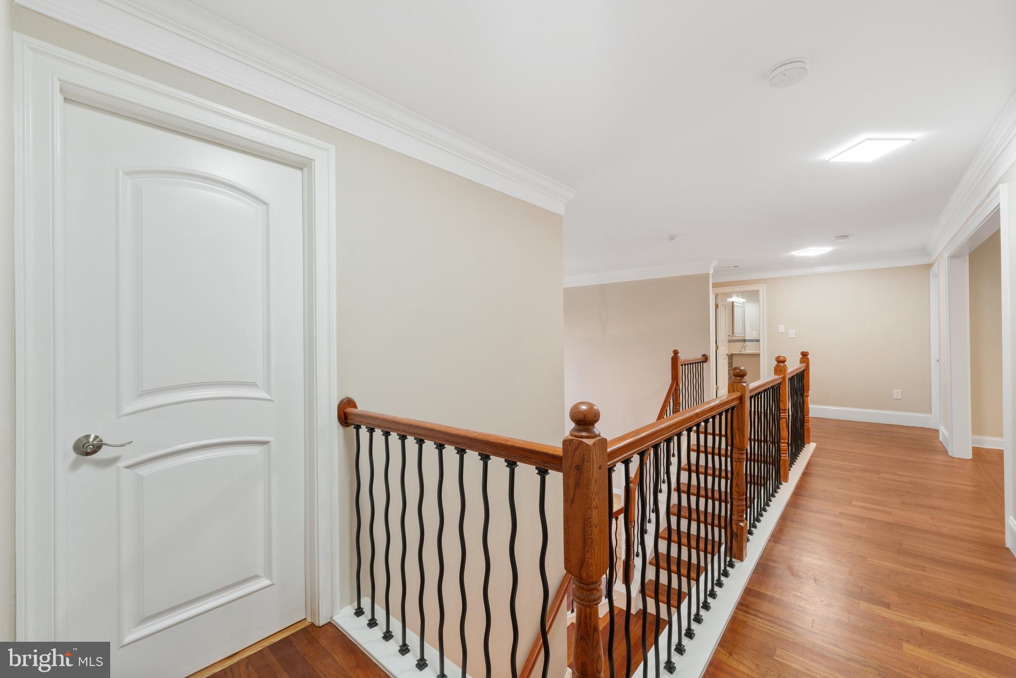 1060 Welsh Road Philadelphia, PA 19115 - Photo 14 of 62 a view of a hallway with wooden floor and staircase