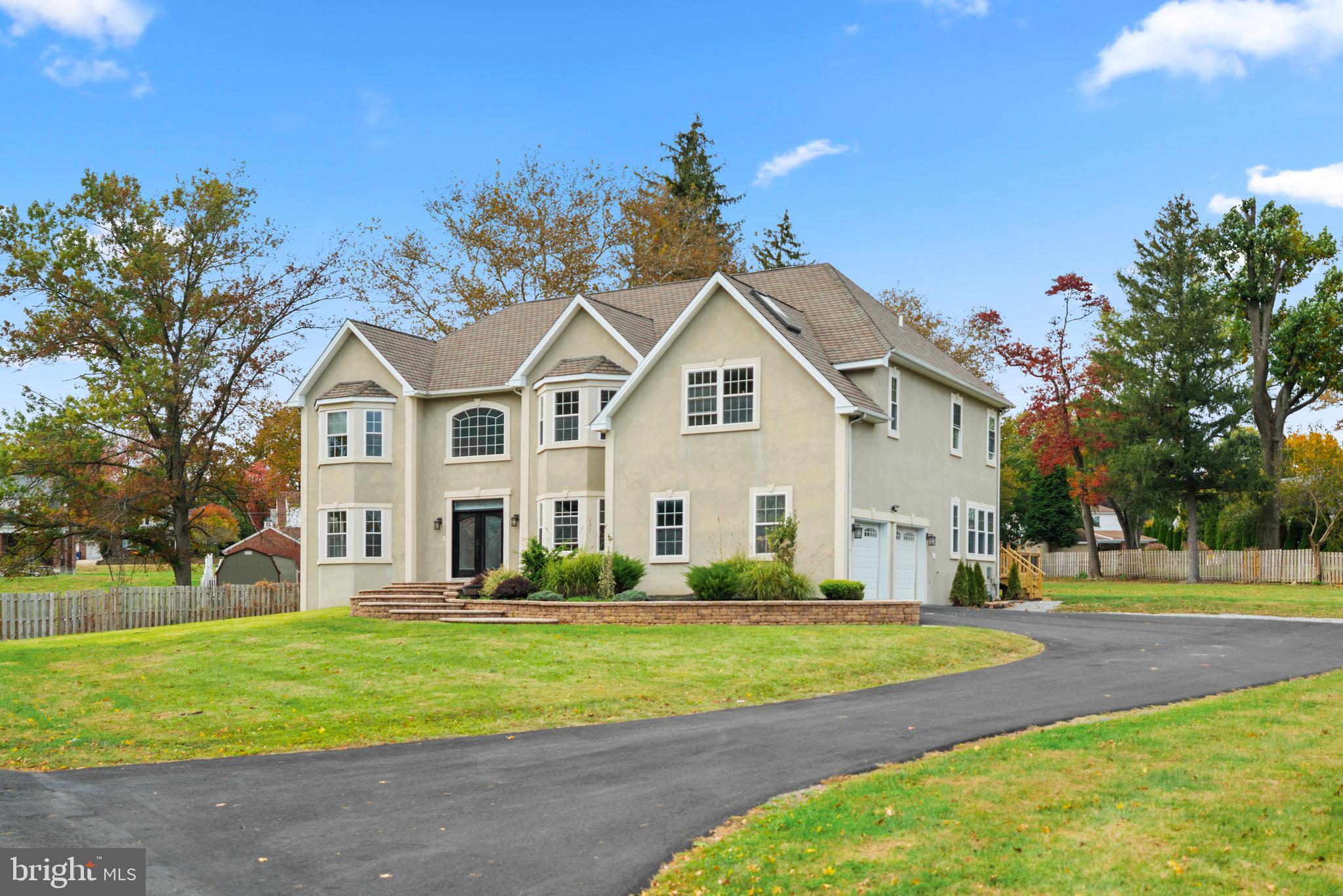 1060 Welsh Road Philadelphia, PA 19115 - Photo 2 of 62 a front view of a house with a yard