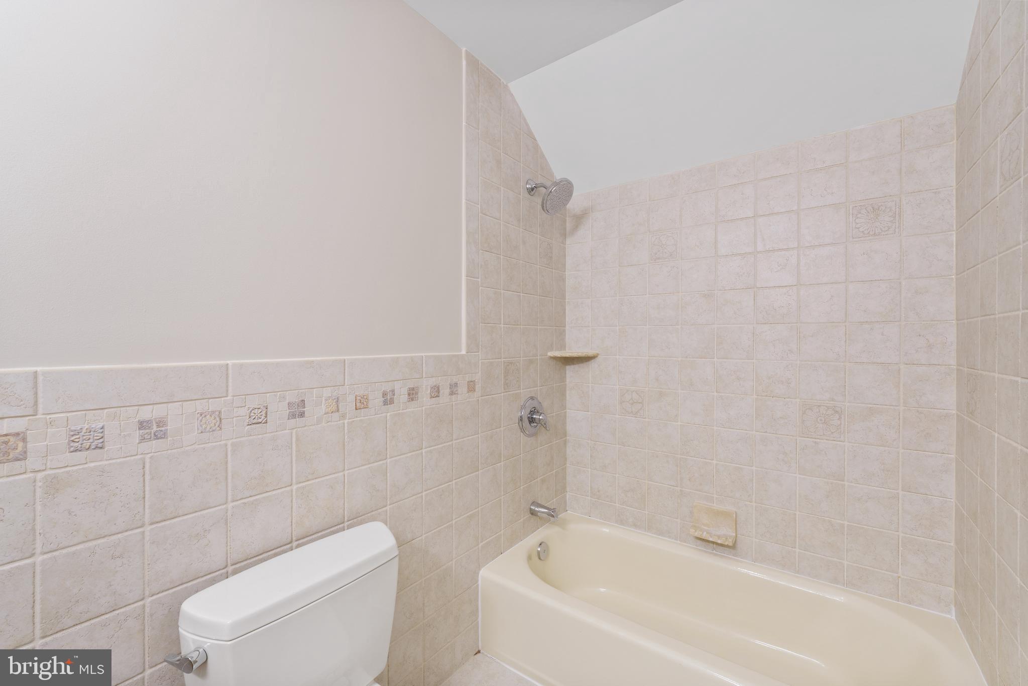 1060 Welsh Road Philadelphia, PA 19115 - Photo 28 of 62 a bathroom with a toilet and shower