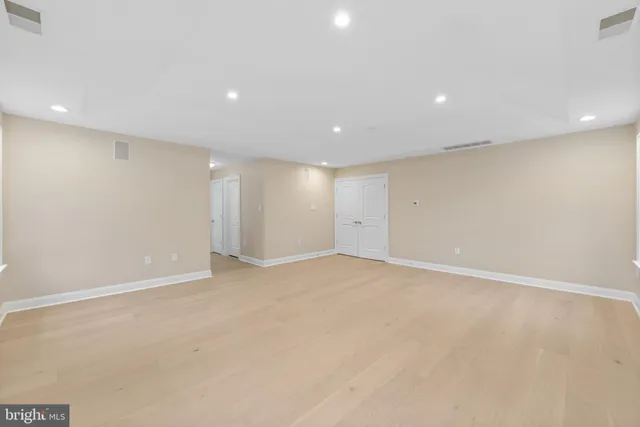 a bathroom with a sink and a window