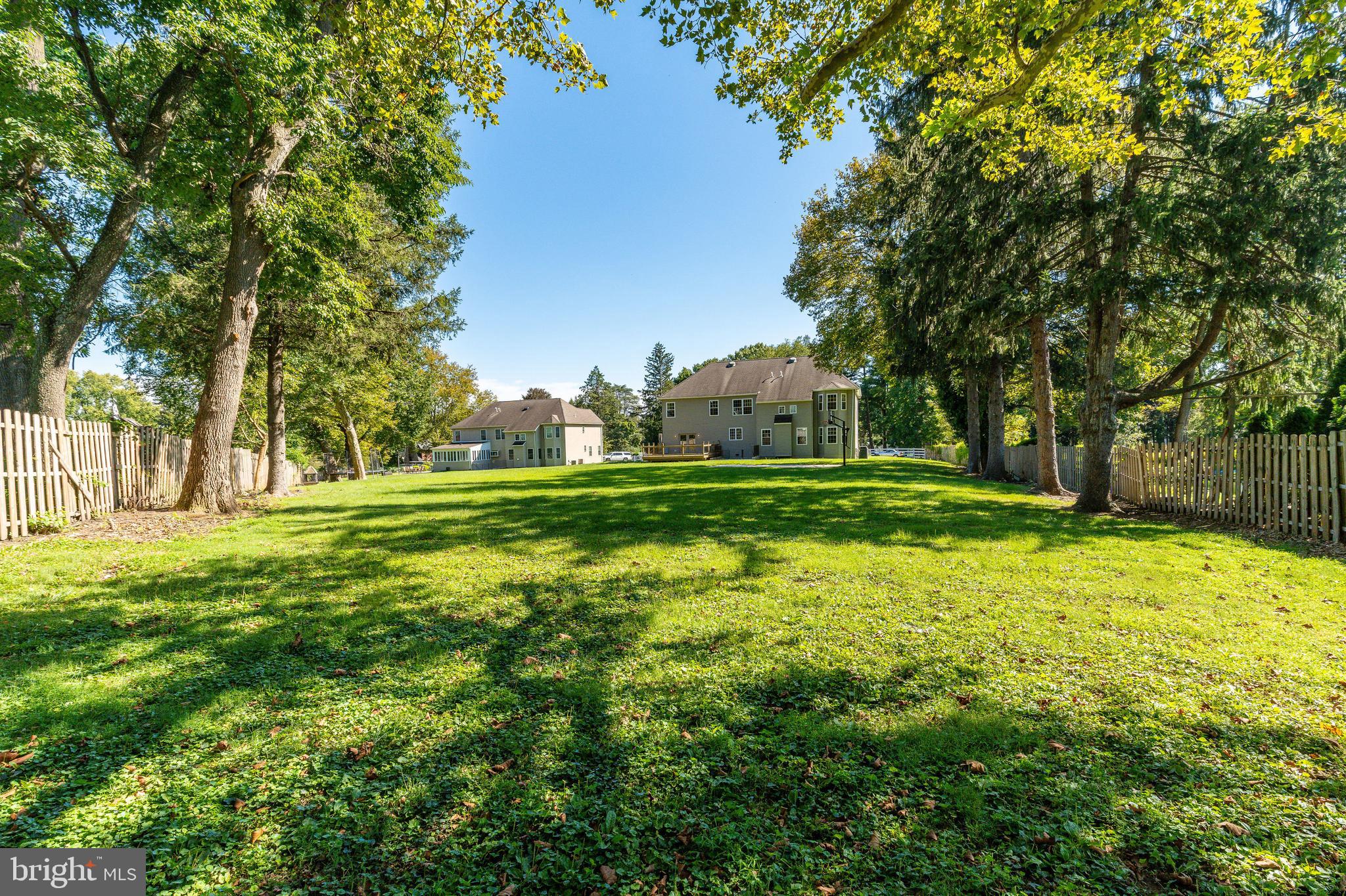 1060 Welsh Road Philadelphia, PA 19115 - Photo 45 of 62 a backyard of a house with lots of green space