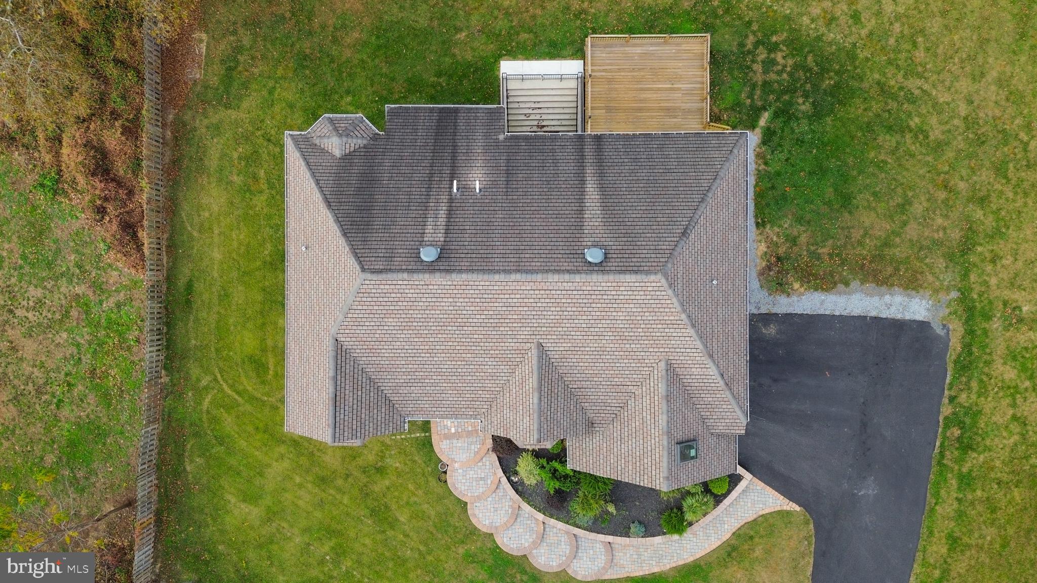 1060 Welsh Road Philadelphia, PA 19115 - Photo 51 of 62 an aerial view of a house with a yard and potted plants
