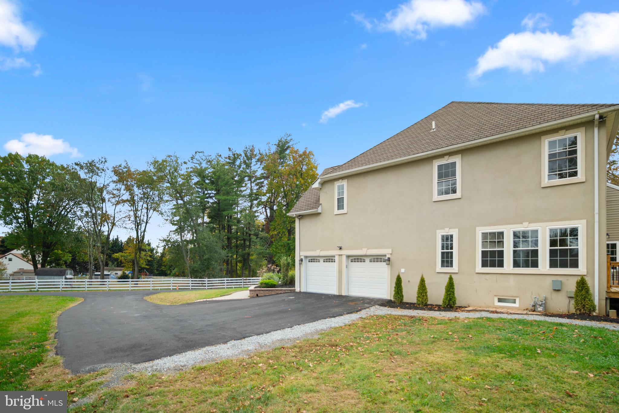 1060 Welsh Road Philadelphia, PA 19115 - Photo 59 of 62 a view of a house with a yard and a basket ball ground