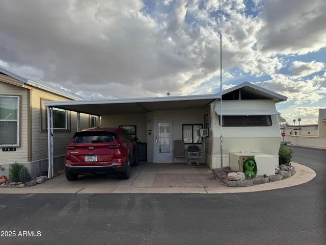 a car parked in front of a house