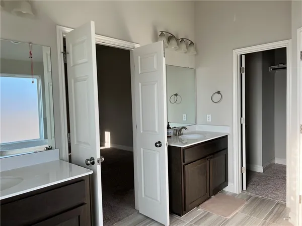 a kitchen with a sink and stove