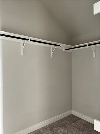 a view of a room with racks on the wall