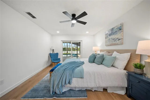 a bed room with a bed and a window