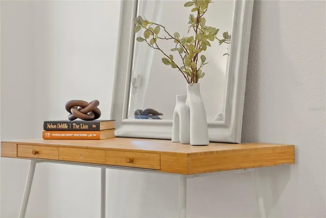 a vase of flowers sitting on a table