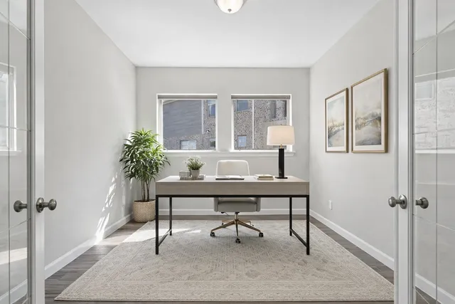 a room with lots of wooden furniture and appliances