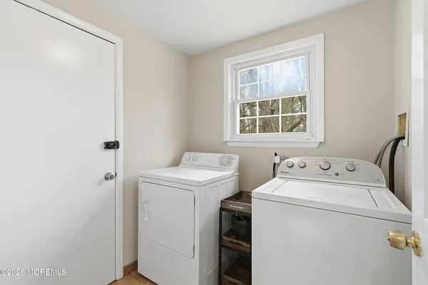 a utility room with dryer and washer