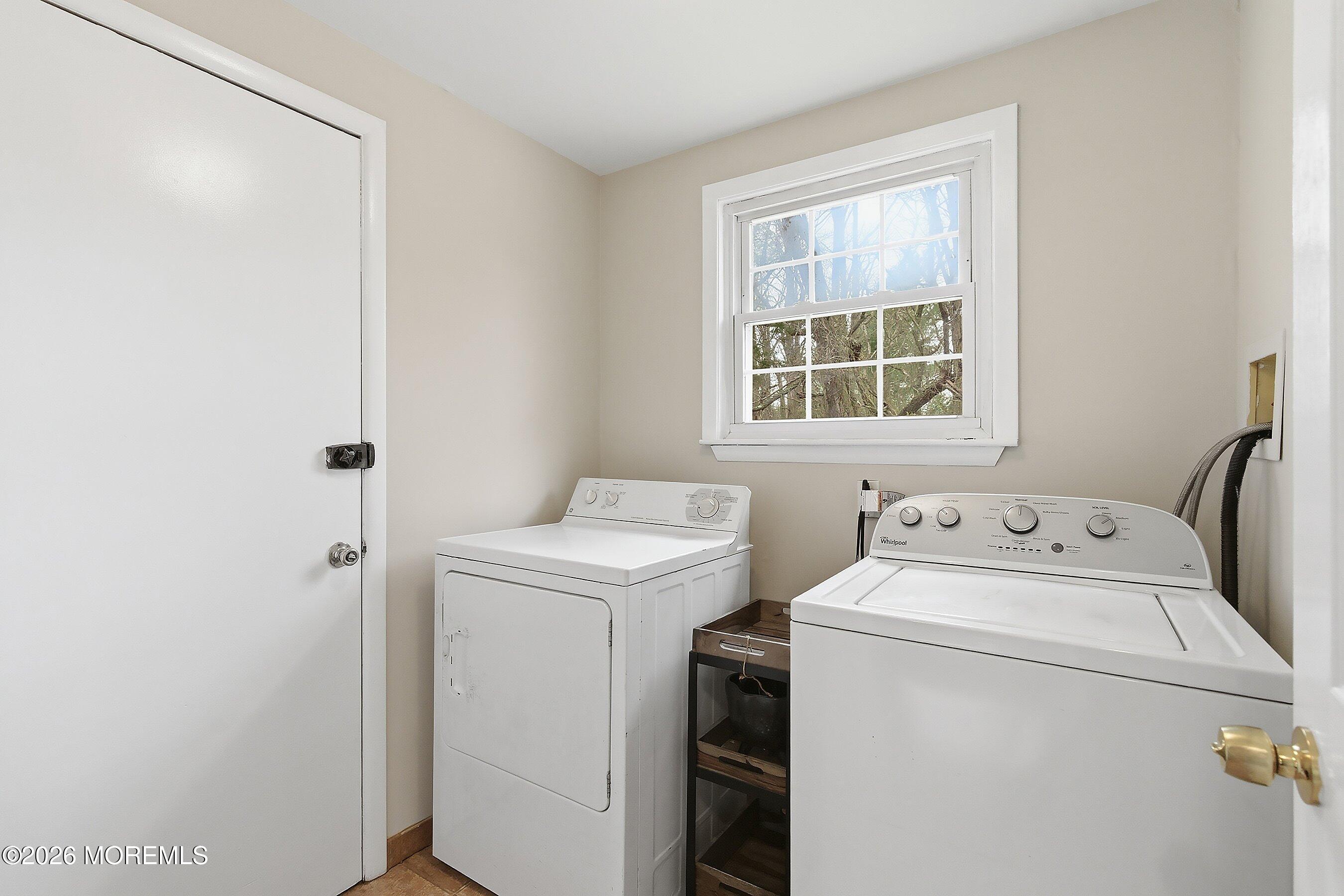 9 Bell Court Howell, NJ 07731 - Photo 22 of 30 a utility room with dryer and washer