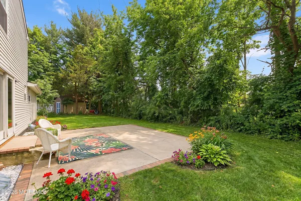 a view of a garden with an outdoor space