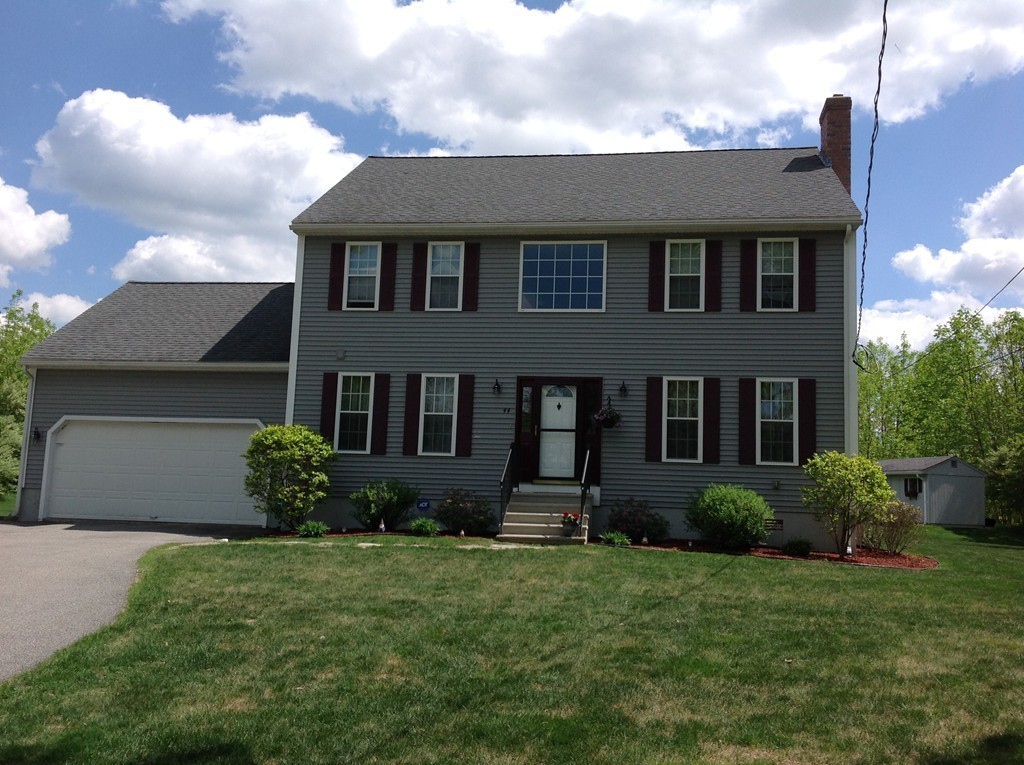 44 Tobin Road Leicester, MA 01611 - Photo 1 of 30 a front view of a house with a yard