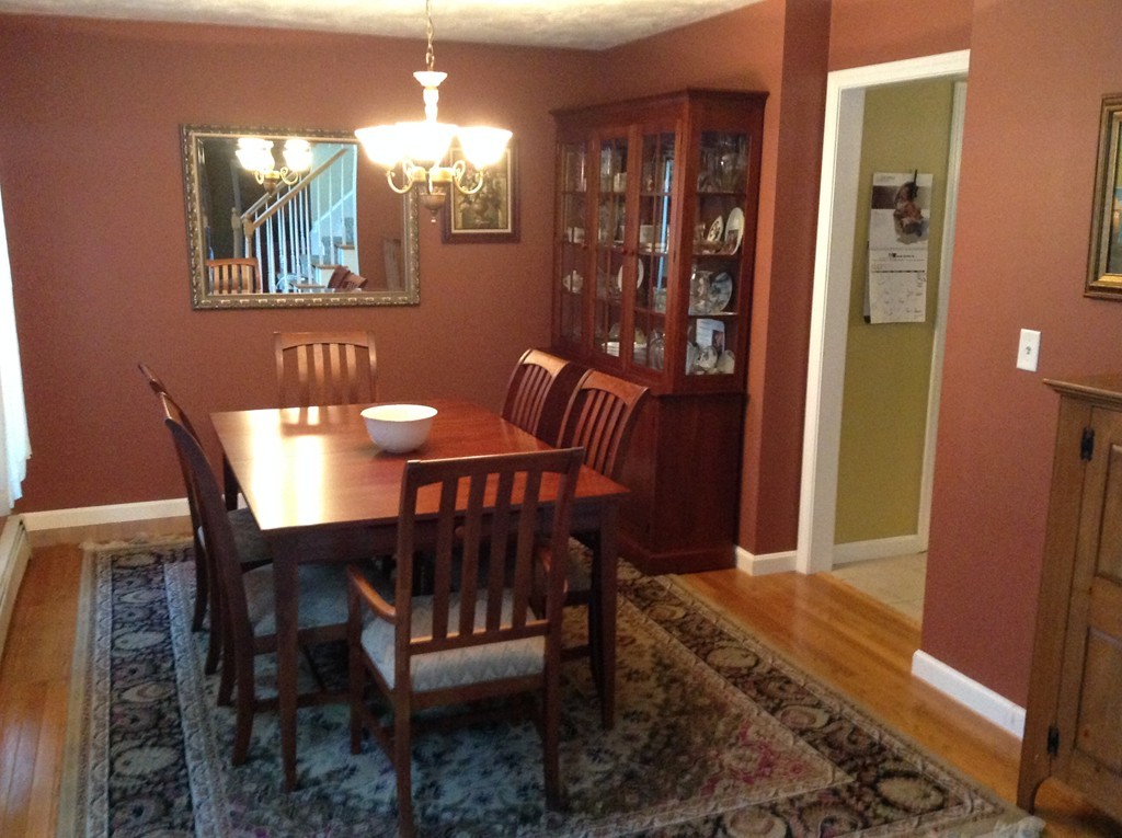 44 Tobin Road Leicester, MA 01611 - Photo 18 of 30 a view of a dining room with furniture and chandelier
