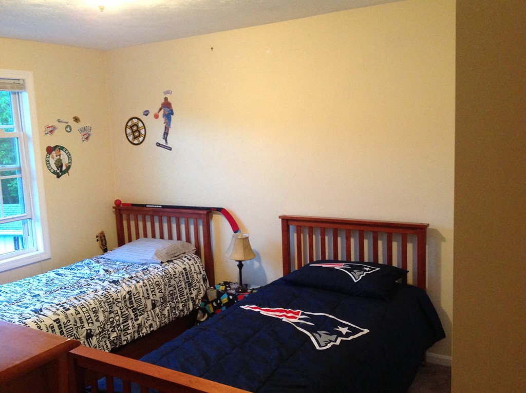 44 Tobin Road Leicester, MA 01611 - Photo 20 of 30 a bedroom with a bed and painting on the wall