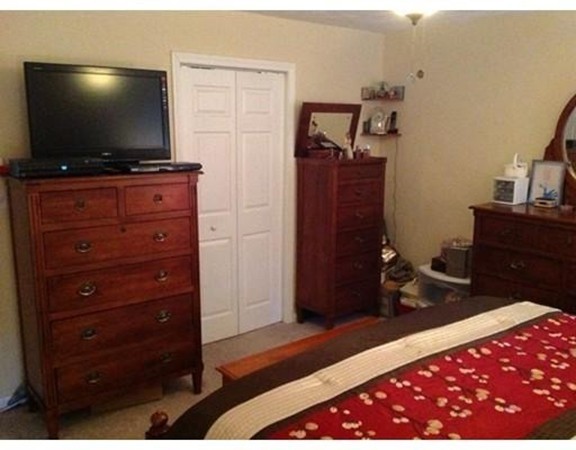 44 Tobin Road Leicester, MA 01611 - Photo 24 of 30 a living room with furniture and a flat screen tv