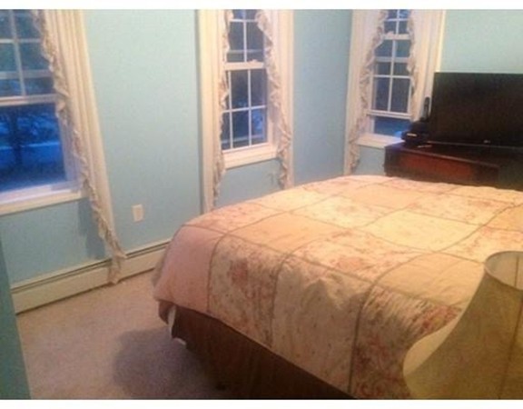 44 Tobin Road Leicester, MA 01611 - Photo 25 of 30 a bedroom with a bed and a window