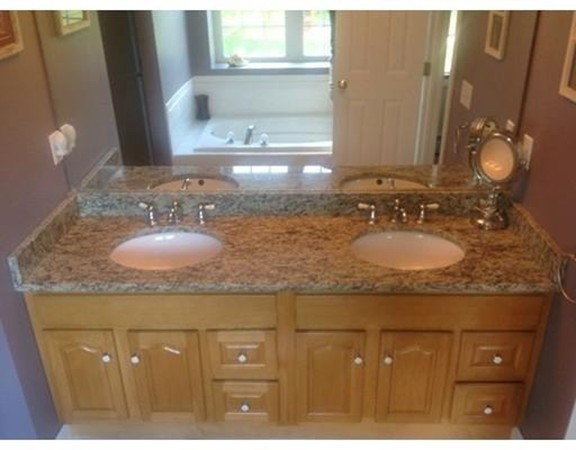 44 Tobin Road Leicester, MA 01611 - Photo 26 of 30 a bathroom with a granite countertop sink and a mirror