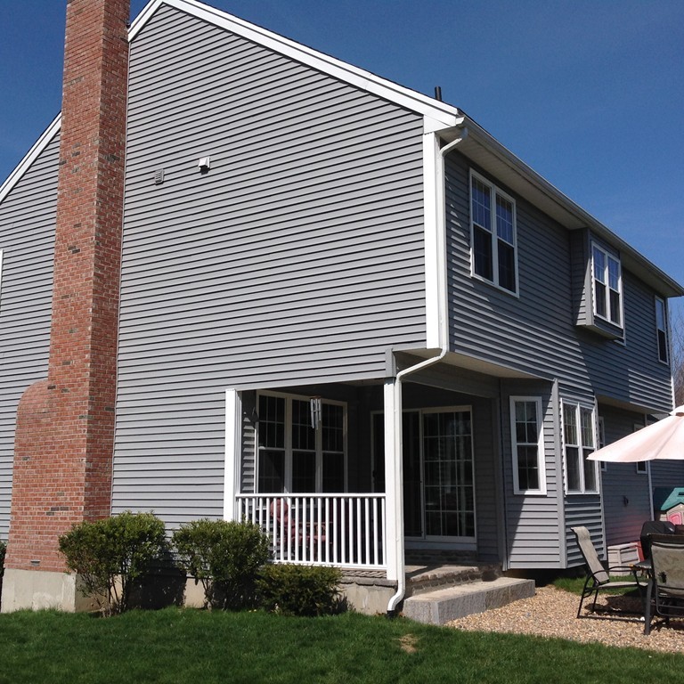 44 Tobin Road Leicester, MA 01611 - Photo 4 of 30 a front view of a house with a yard
