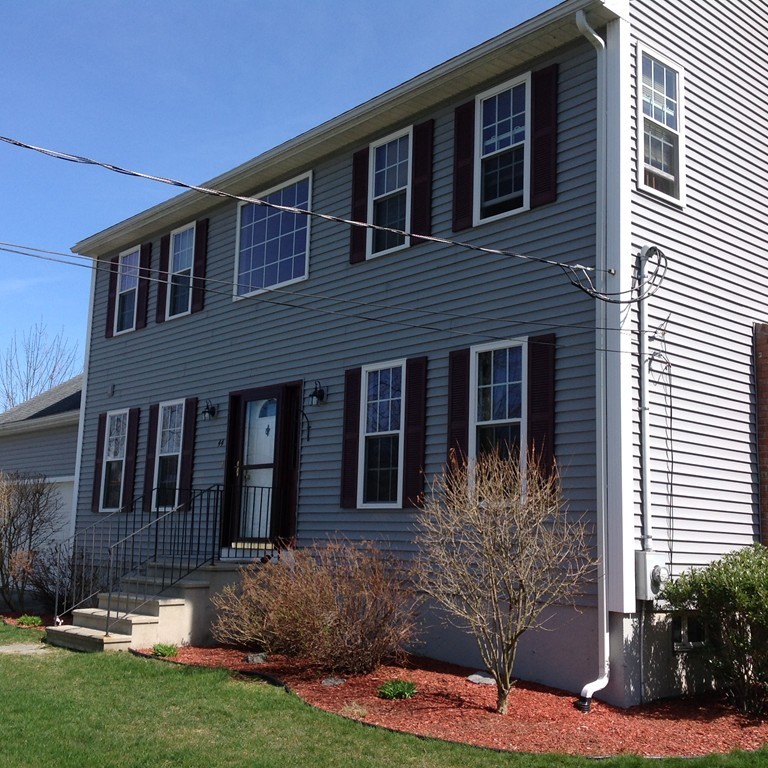 44 Tobin Road Leicester, MA 01611 - Photo 5 of 30 a front view of a house with a yard