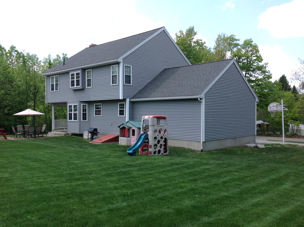 44 Tobin Road Leicester, MA 01611 - Photo 8 of 30 a front view of house with yard and seating area