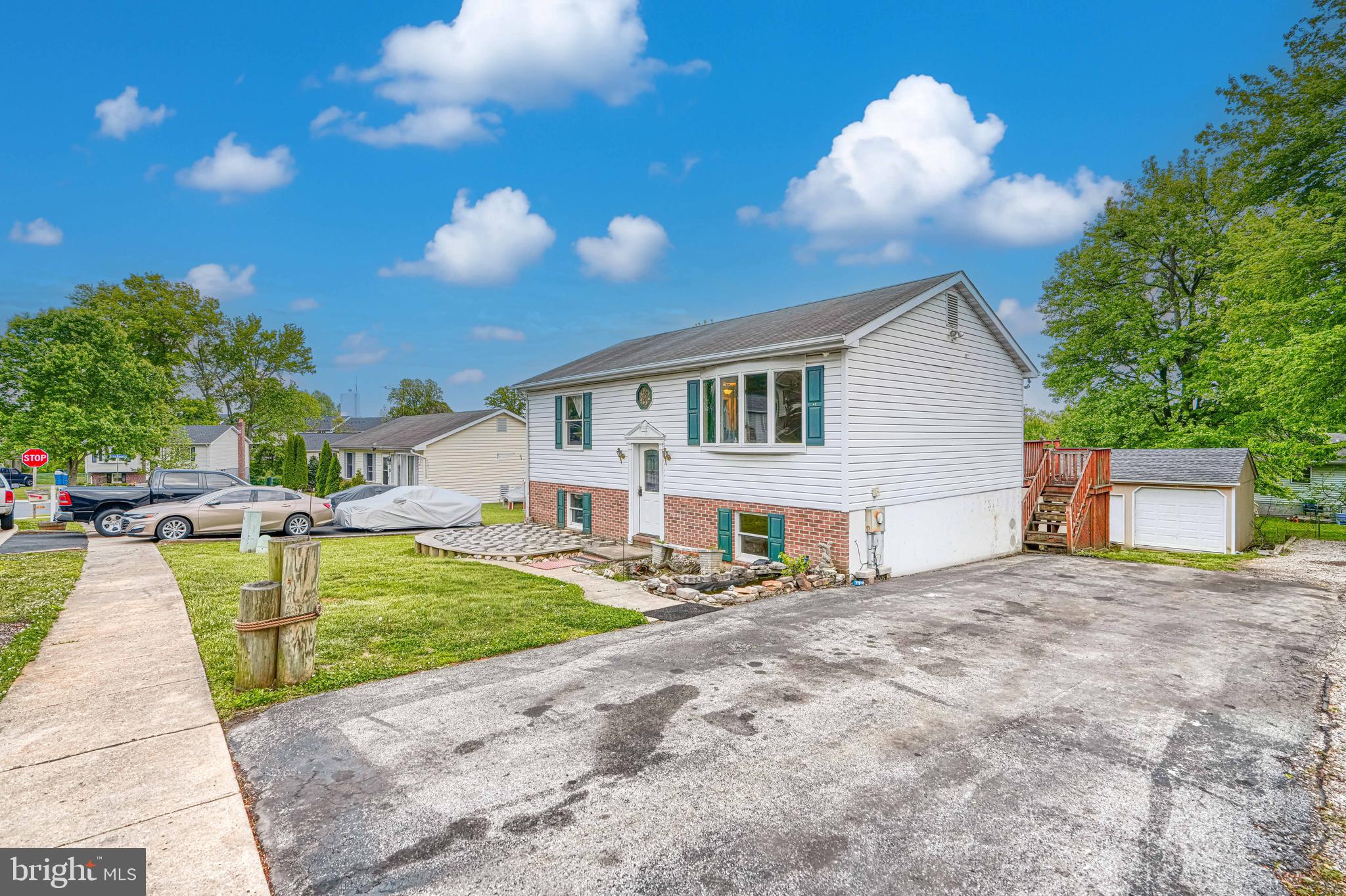 708 Gray Mt Circle Elkton, MD 21921 - Photo 2 of 59 a view of a house with a patio and a yard