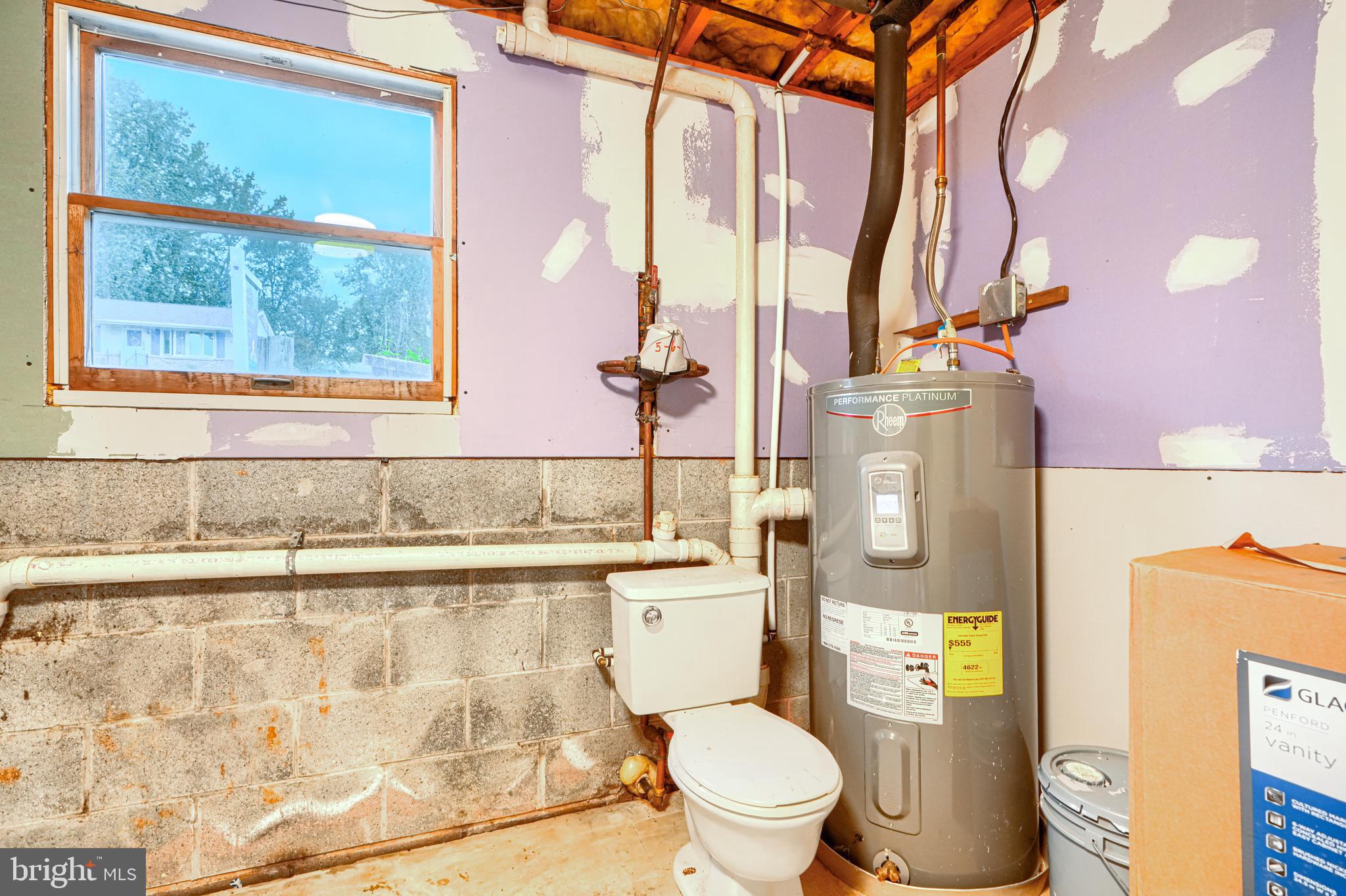 708 Gray Mt Circle Elkton, MD 21921 - Photo 56 of 59 a bathroom with a granite countertop sink and a toilet