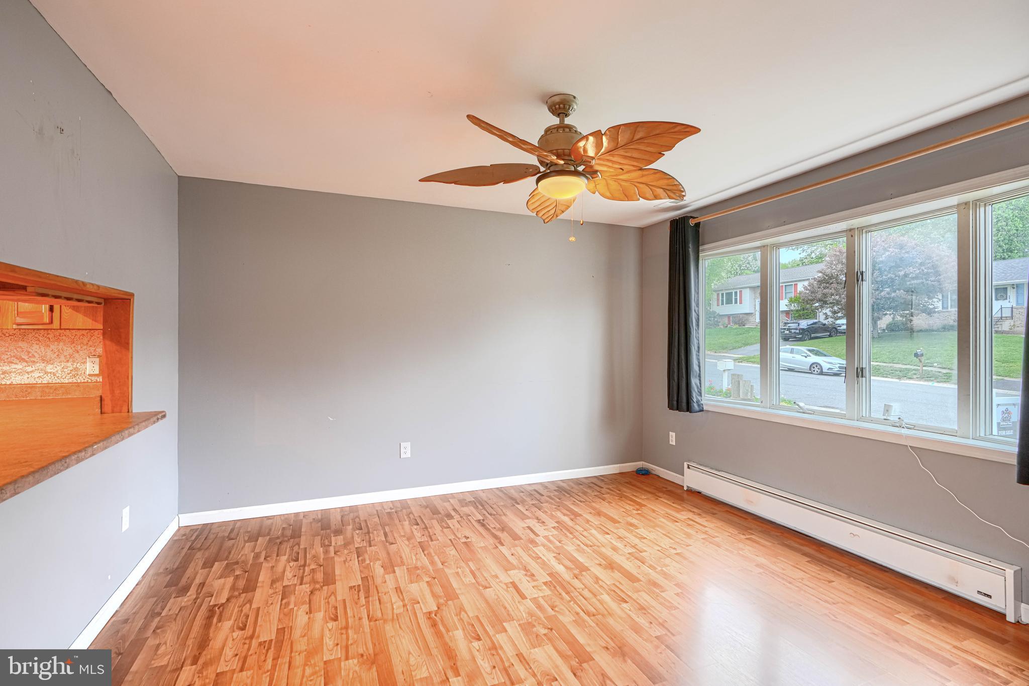 708 Gray Mt Circle Elkton, MD 21921 - Photo 8 of 59 a view of a room with a ceiling fan and a window