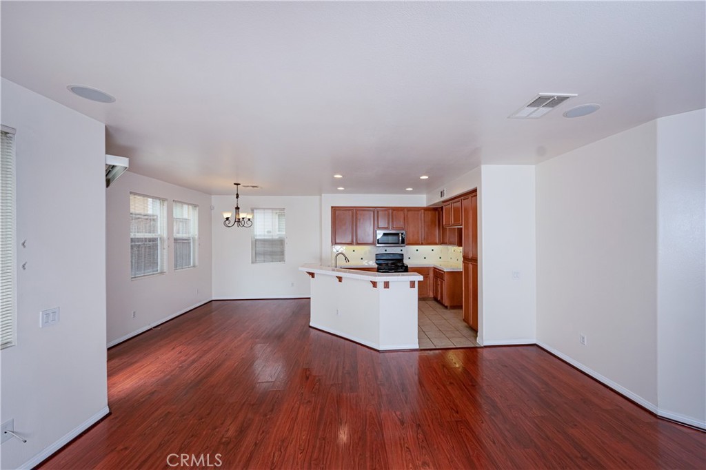 3663 Scribner Lane Inglewood, CA 90305 - Photo 3 of 18 a view of kitchen with wooden floor and kitchen