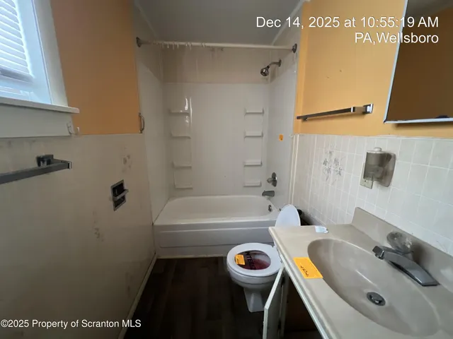 a bathroom with a sink and a bathtub