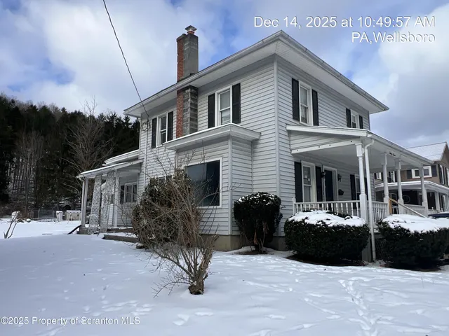 a view of a house with a patio