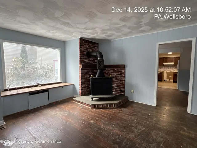 an empty room with windows