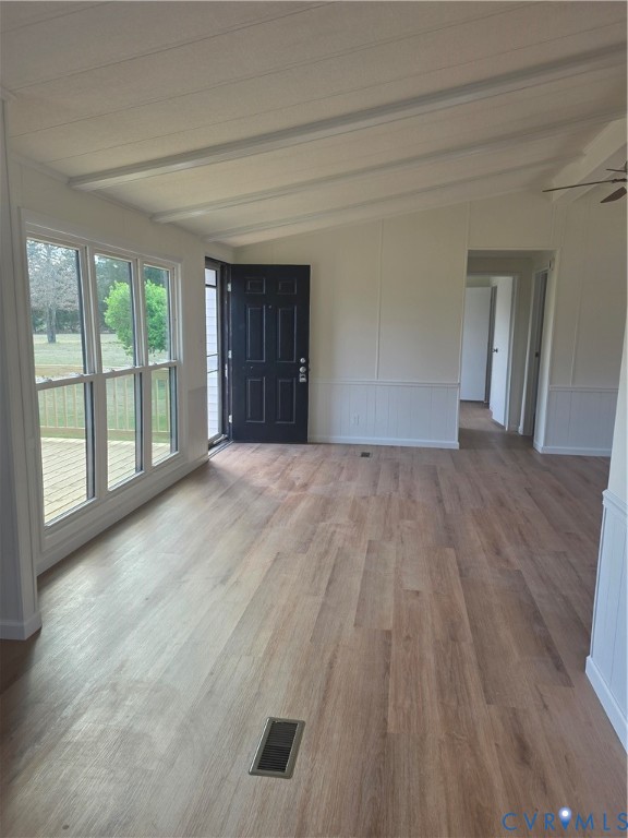 16808 Hamilton Arms Road Dewitt, VA 23840 - Photo 11 of 30 a view of an empty room with wooden floor and a window