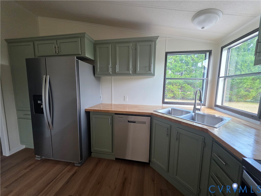16808 Hamilton Arms Road Dewitt, VA 23840 - Photo 15 of 30 a kitchen with stainless steel appliances granite countertop a refrigerator sink and window