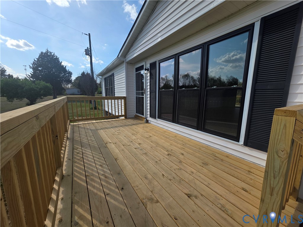 16808 Hamilton Arms Road Dewitt, VA 23840 - Photo 4 of 30 a view of balcony with wooden floor