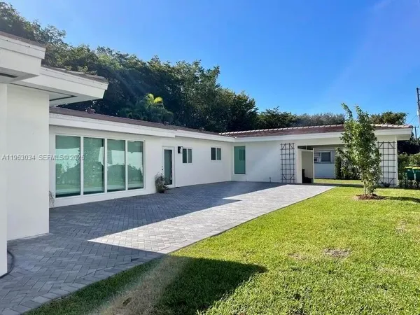 front view of a house with a patio