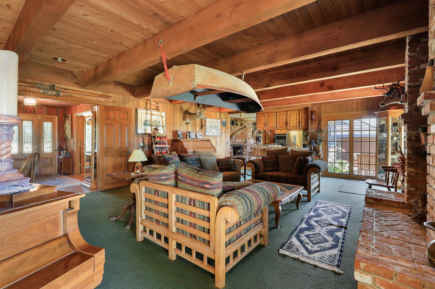 22050 Buena Vista Road Clements, CA 95227 - Photo 11 of 61 a living room with furniture and a flat screen tv