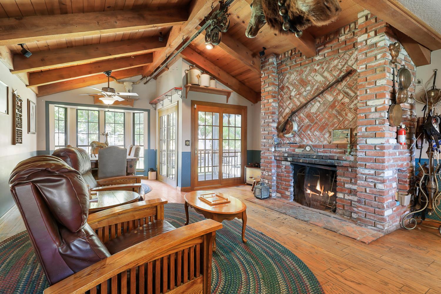 22050 Buena Vista Road Clements, CA 95227 - Photo 20 of 61 a living room with furniture and a fireplace